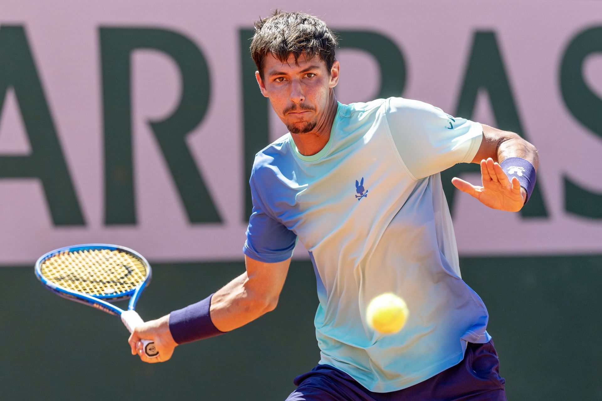 Alexei Popyrin hits a forehand | Image Source: Getty